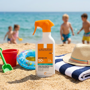 Spray solar familiar Anthelios de La Roche-Posay en uso al aire libre