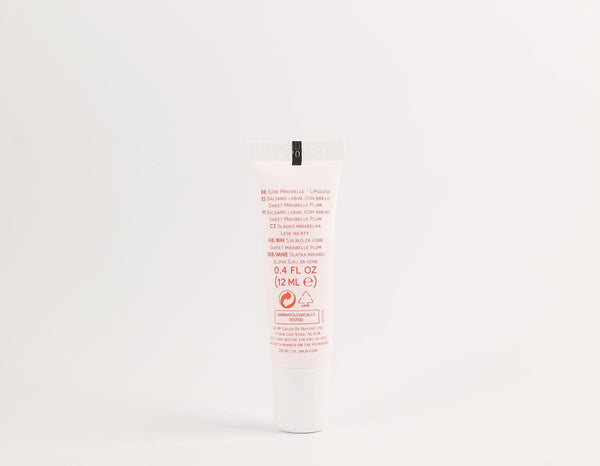 Dorso del tubo del brillo labial Ziaja Juicy Sweet Mirabelle Plum